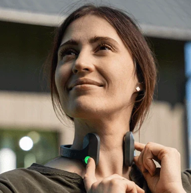 Pulsetto vagus nerve stimulation device close-up with green power button